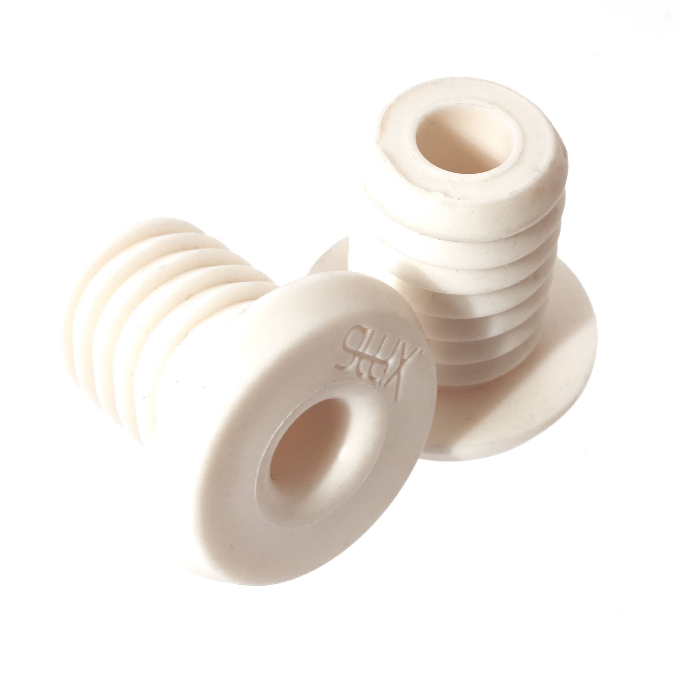 Zwei weiße Lenkerenden aus Gummi nebeneinander